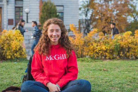 Young student poses for a photo on mcgill campus